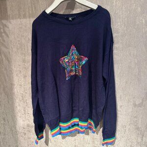 Navy jumper with sequin star pattern